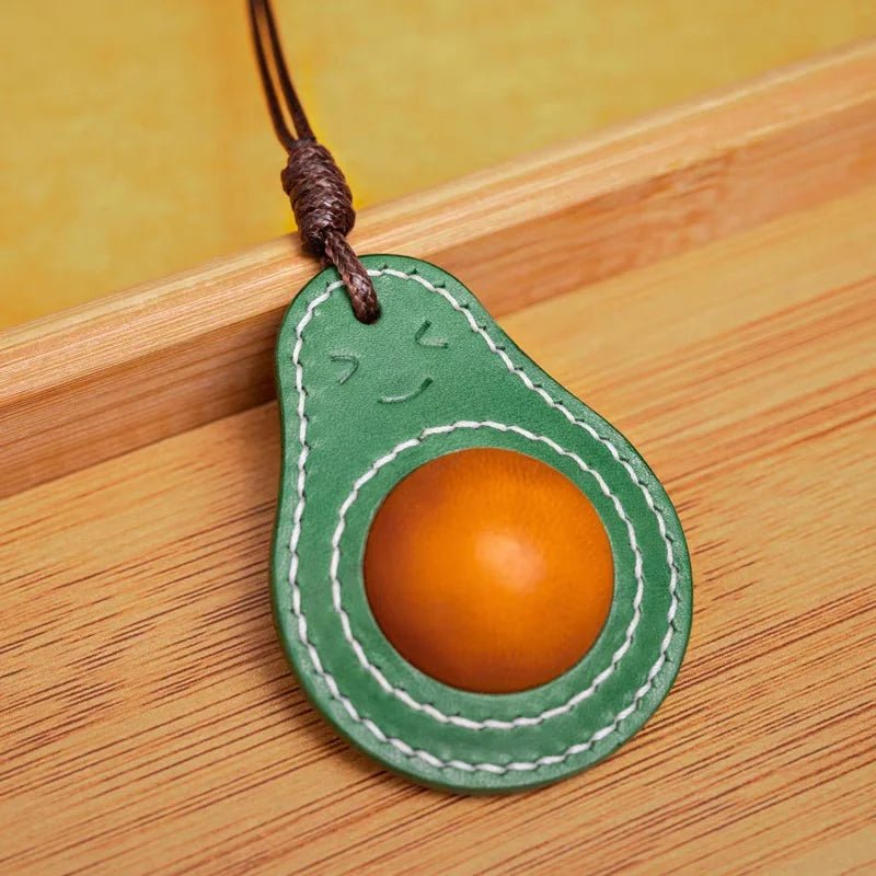 Smiling Avocado Leather Bag Charm – Handmade Italian Vegetable - Tanned Keychain | Whimsical Green Fruit Pendant | Cute Handbag Accessory for Women - shewearing