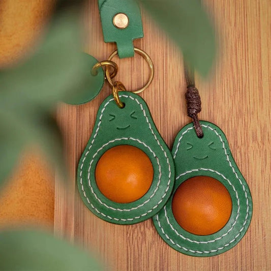 Smiling Avocado Leather Bag Charm – Handmade Italian Vegetable - Tanned Keychain | Whimsical Green Fruit Pendant | Cute Handbag Accessory for Women - shewearing